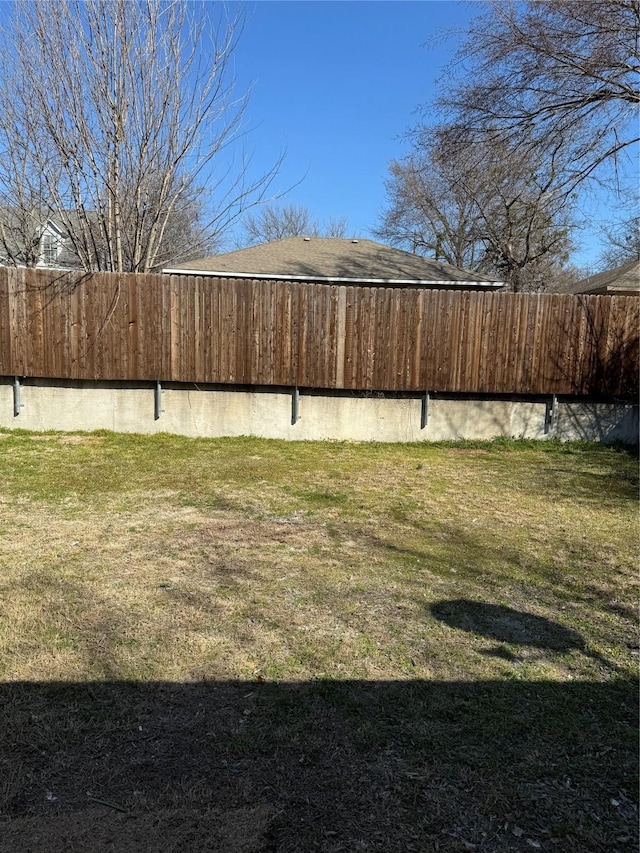 view of yard featuring fence