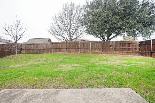 view of yard featuring a fenced backyard