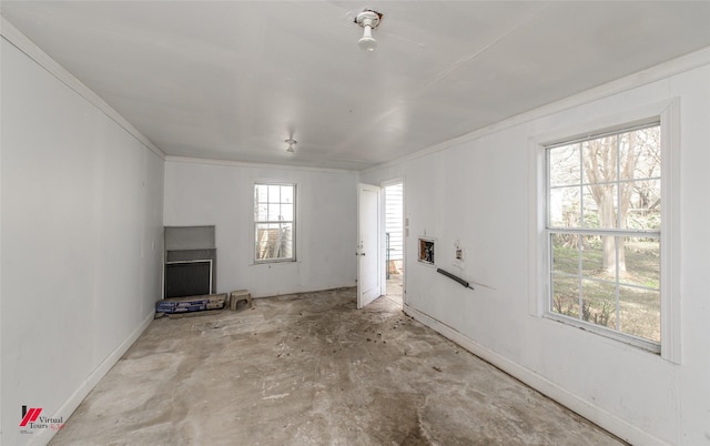 unfurnished living room featuring a fireplace and unfinished concrete flooring