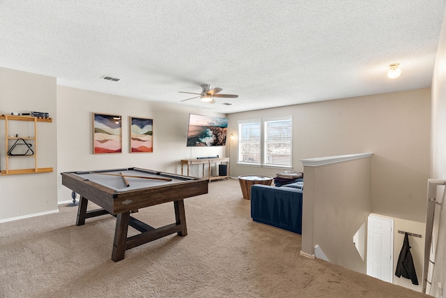 rec room featuring carpet floors, pool table, a ceiling fan, a textured ceiling, and baseboards