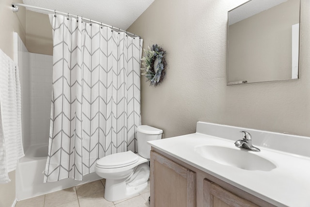 bathroom featuring a textured ceiling, toilet, vanity, tile patterned floors, and shower / bathtub combination with curtain