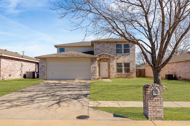 traditional-style house with brick siding, concrete driveway, an attached garage, central AC, and a front yard