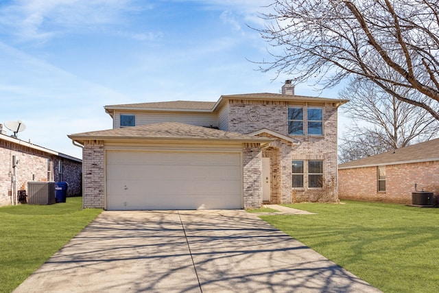 traditional-style home featuring central air condition unit, an attached garage, and a front yard