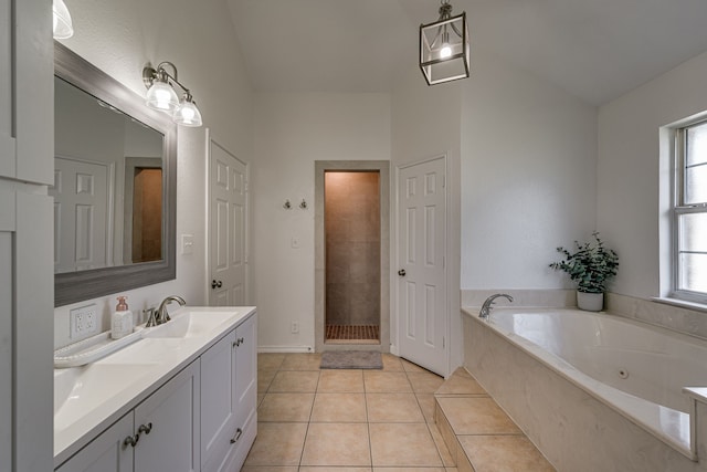 full bath with double vanity, tile patterned floors, a sink, a tile shower, and a bath