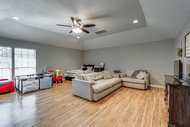 living area with recessed lighting, visible vents, ceiling fan, and light wood finished floors