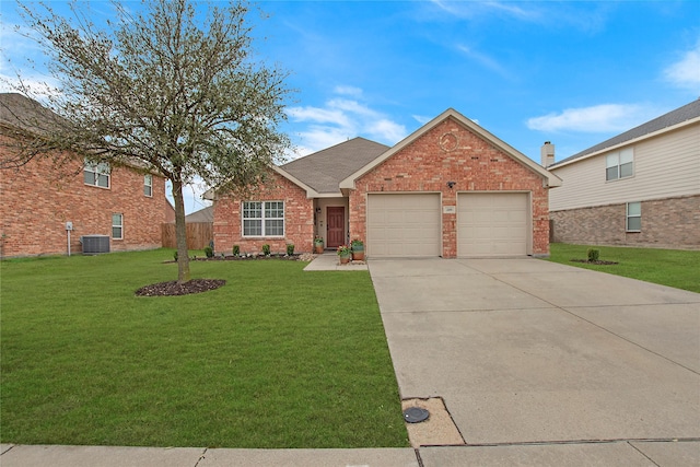 ranch-style home featuring brick siding, concrete driveway, an attached garage, a front yard, and central AC