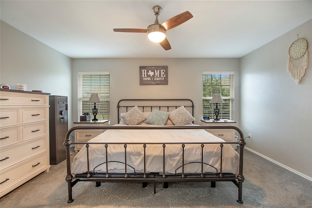 bedroom featuring carpet, baseboards, and a ceiling fan