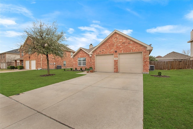 view of front facade featuring an attached garage, driveway, brick siding, and a front yard