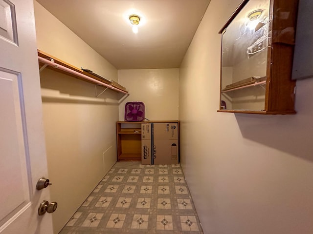 walk in closet featuring tile patterned floors