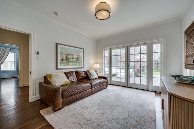 6306 Tremont St, Dallas, TX 75214 - living area featuring french doors, healthy amount of natural light, dark wood finished floors, crown molding, and baseboards