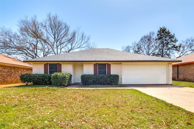 ranch-style home with a garage, driveway, a front lawn, and brick siding