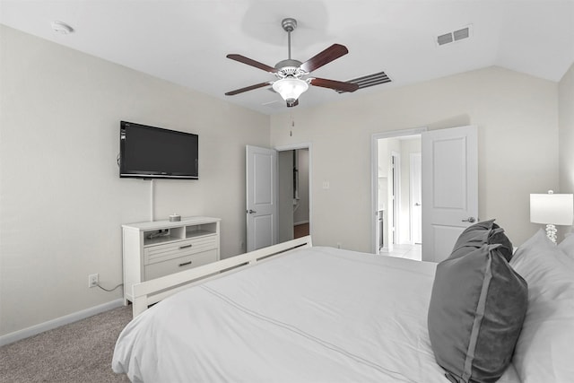 bedroom featuring ceiling fan, carpet floors, visible vents, baseboards, and vaulted ceiling