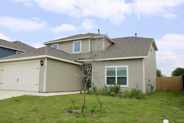 view of front facade featuring a garage, a shingled roof, fence, driveway, and a front yard