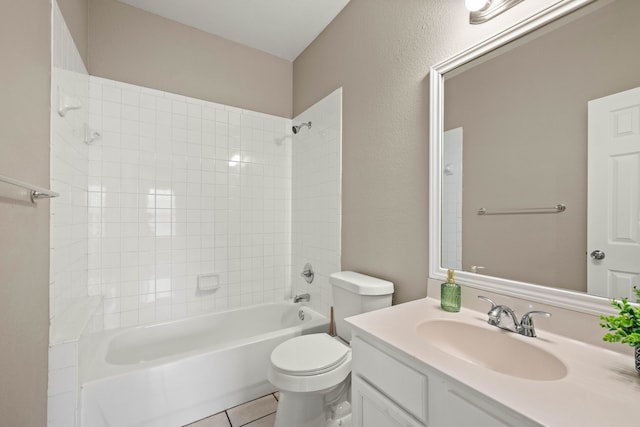 full bath featuring tile patterned flooring, vanity, toilet, and bathing tub / shower combination