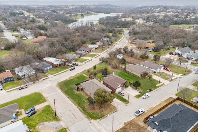 bird's eye view featuring a water view and a residential view