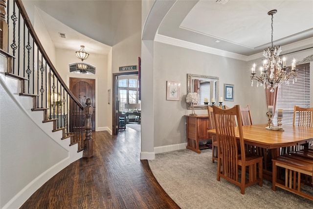 dining area featuring visible vents, crown molding, baseboards, stairway, and an inviting chandelier