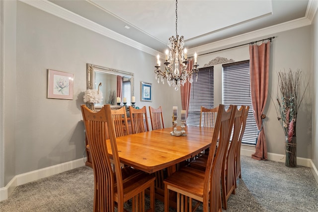 dining room with carpet, baseboards, and ornamental molding