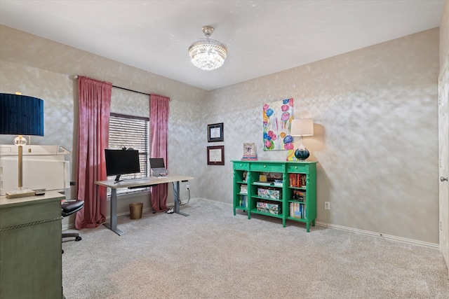 carpeted office featuring baseboards and a notable chandelier