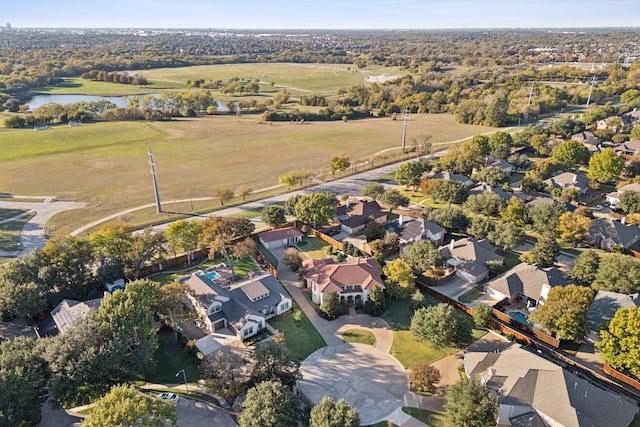 bird's eye view with a residential view and a water view