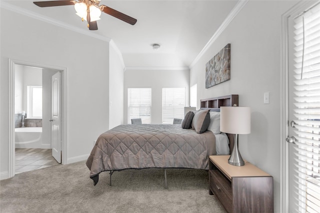 bedroom with ornamental molding, multiple windows, carpet flooring, and baseboards