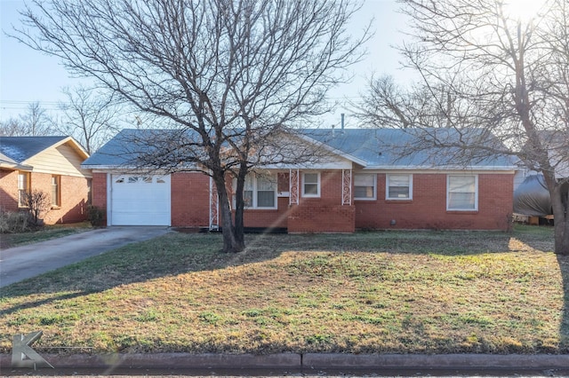 single story home with concrete driveway, brick siding, a front lawn, and an attached garage