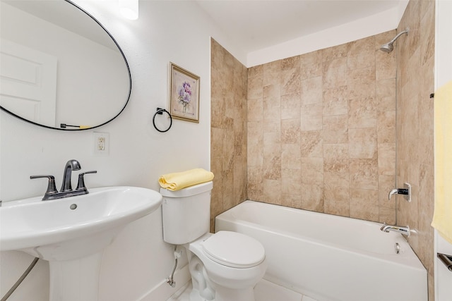 full bathroom with a sink, shower / tub combination, and toilet