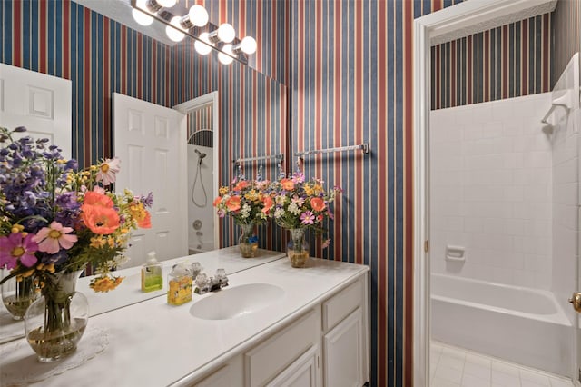 full bath with tile patterned floors, bathtub / shower combination, vanity, and wallpapered walls