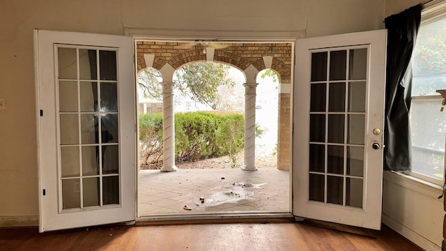 doorway featuring wood finished floors