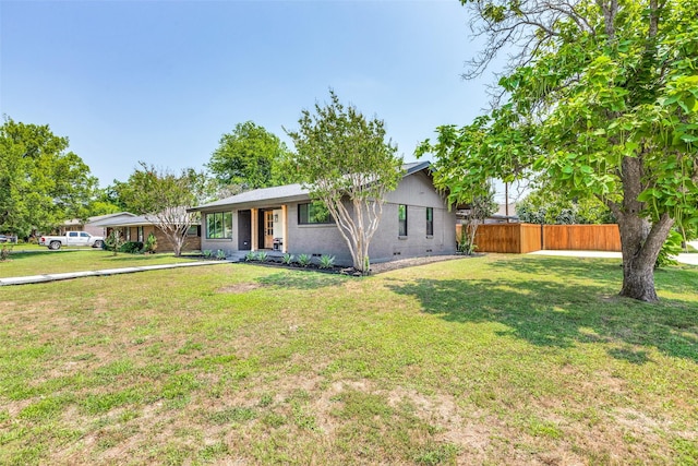 ranch-style home with crawl space, brick siding, fence, and a front lawn