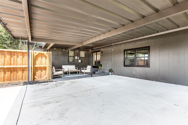 view of patio with fence and an outdoor living space