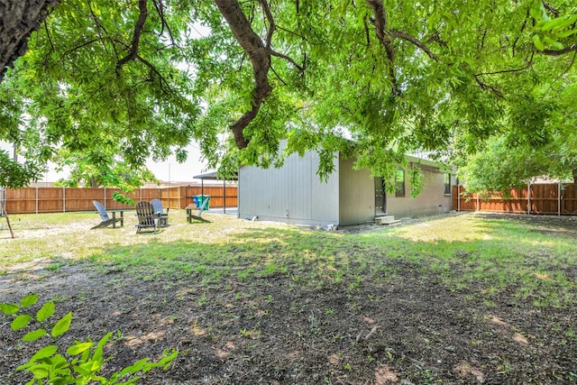 view of yard featuring a fenced backyard