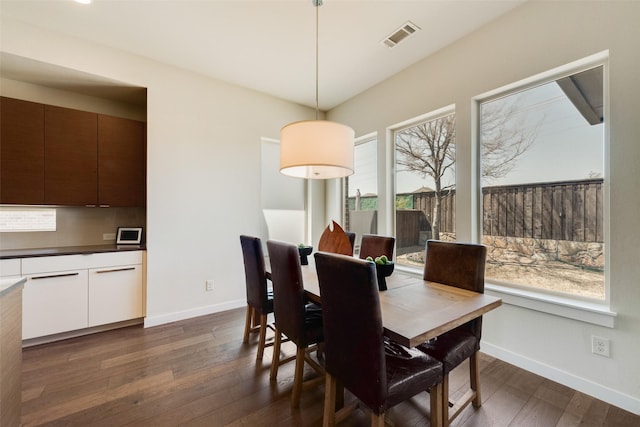 3743 Pistol Creek Dr, Frisco, TX 75034 - dining space featuring dark wood-style flooring and baseboards