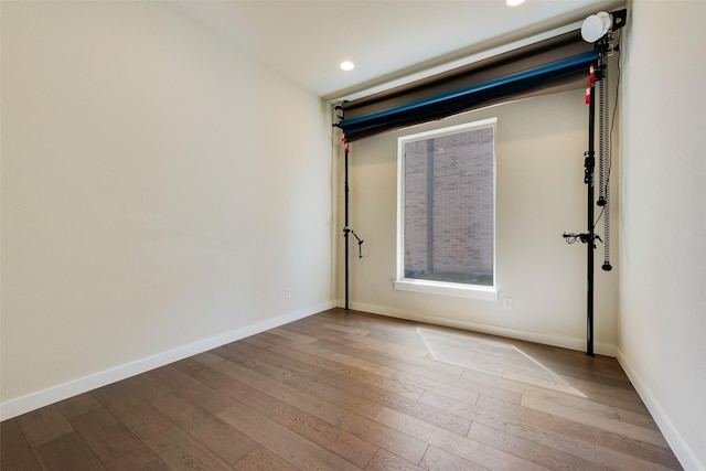 3743 Pistol Creek Dr, Frisco, TX 75034 - unfurnished room featuring wood-type flooring, recessed lighting, and baseboards