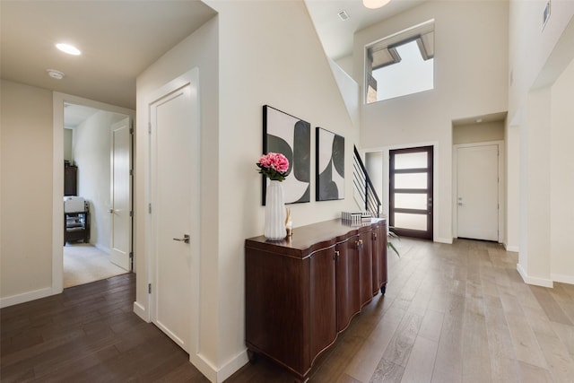 3743 Pistol Creek Dr, Frisco, TX 75034 - foyer featuring wood finished floors, baseboards, and a towering ceiling