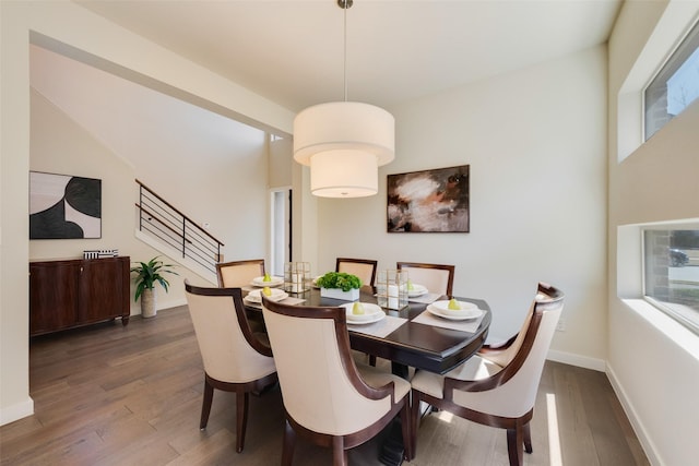 3743 Pistol Creek Dr, Frisco, TX 75034 - dining space with wood finished floors, stairway, and baseboards