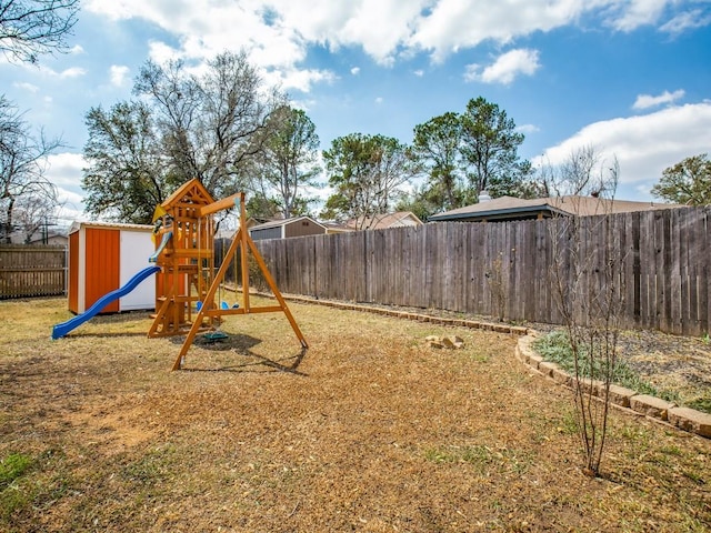 view of play area with a fenced backyard