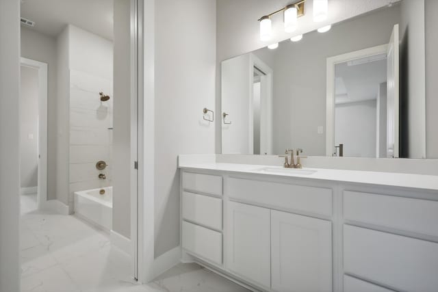 bathroom with shower / bathtub combination, visible vents, vanity, baseboards, and marble finish floor