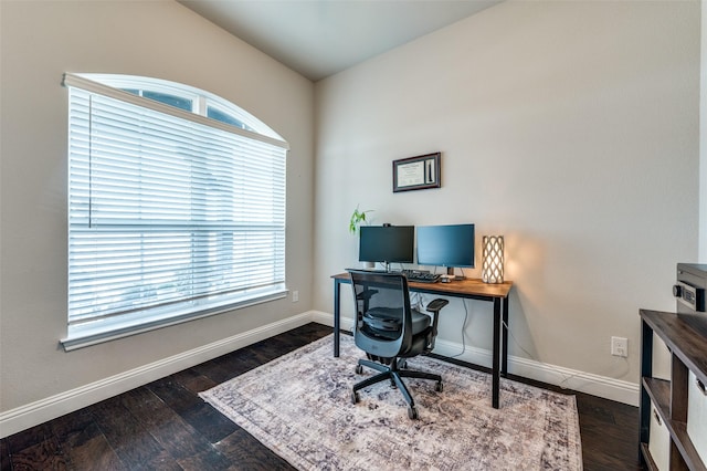 office space featuring a wealth of natural light and baseboards