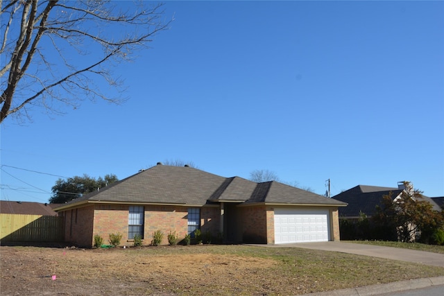 ranch-style house with a garage, brick siding, a shingled roof, fence, and driveway