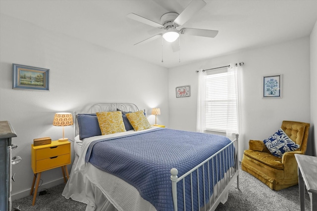 bedroom with carpet, ceiling fan, and baseboards