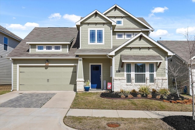 craftsman house with driveway and roof with shingles