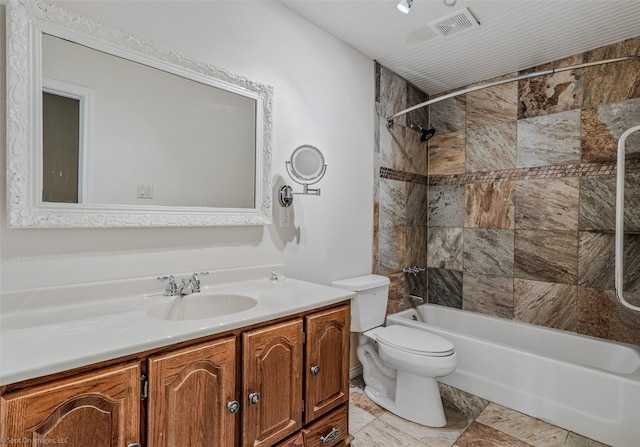 bathroom with shower / bathtub combination, toilet, visible vents, and vanity