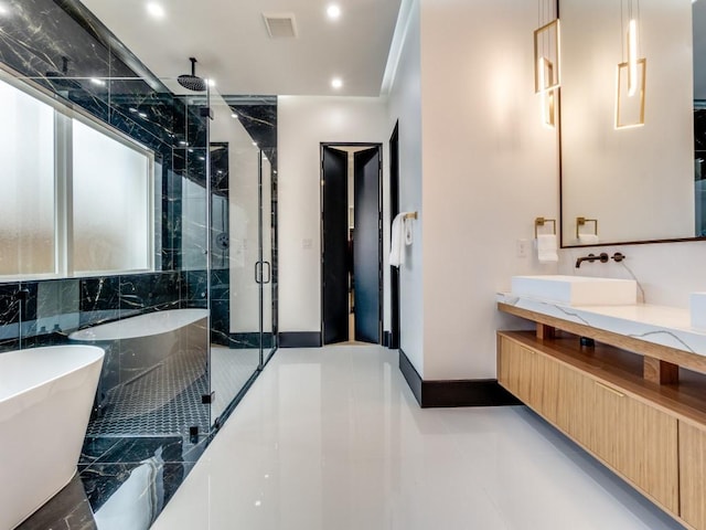 full bath featuring recessed lighting, a soaking tub, visible vents, a shower stall, and vanity