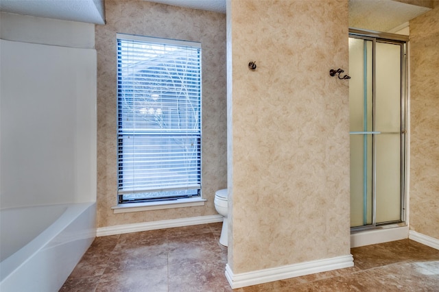 full bathroom with toilet, baseboards, a shower with door, and a healthy amount of sunlight