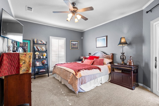 bedroom featuring visible vents, ornamental molding, baseboards, and light colored carpet