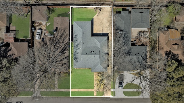 birds eye view of property with a residential view