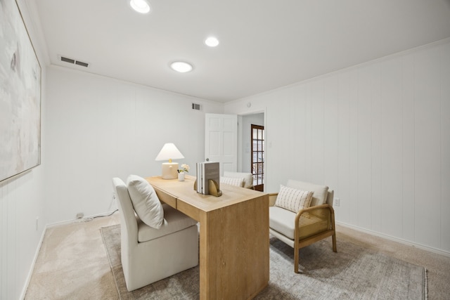 home office with baseboards, visible vents, and light colored carpet