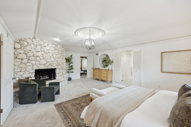 carpeted bedroom with a fireplace