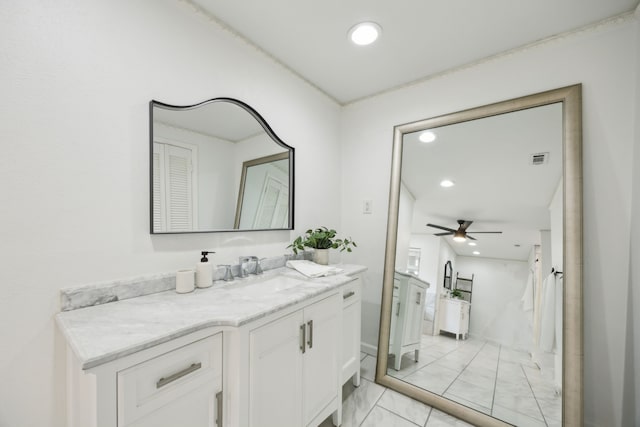 full bath featuring marble finish floor, recessed lighting, a ceiling fan, and vanity