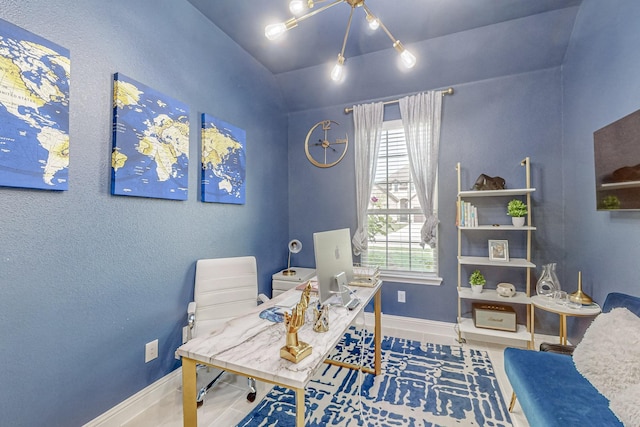 tiled home office featuring rail lighting and baseboards